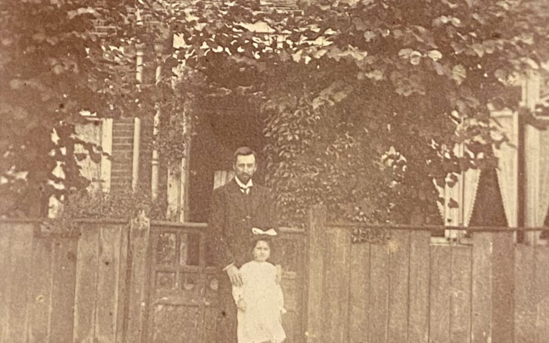 Mary Stella Edwards and her father outside their house in Staines